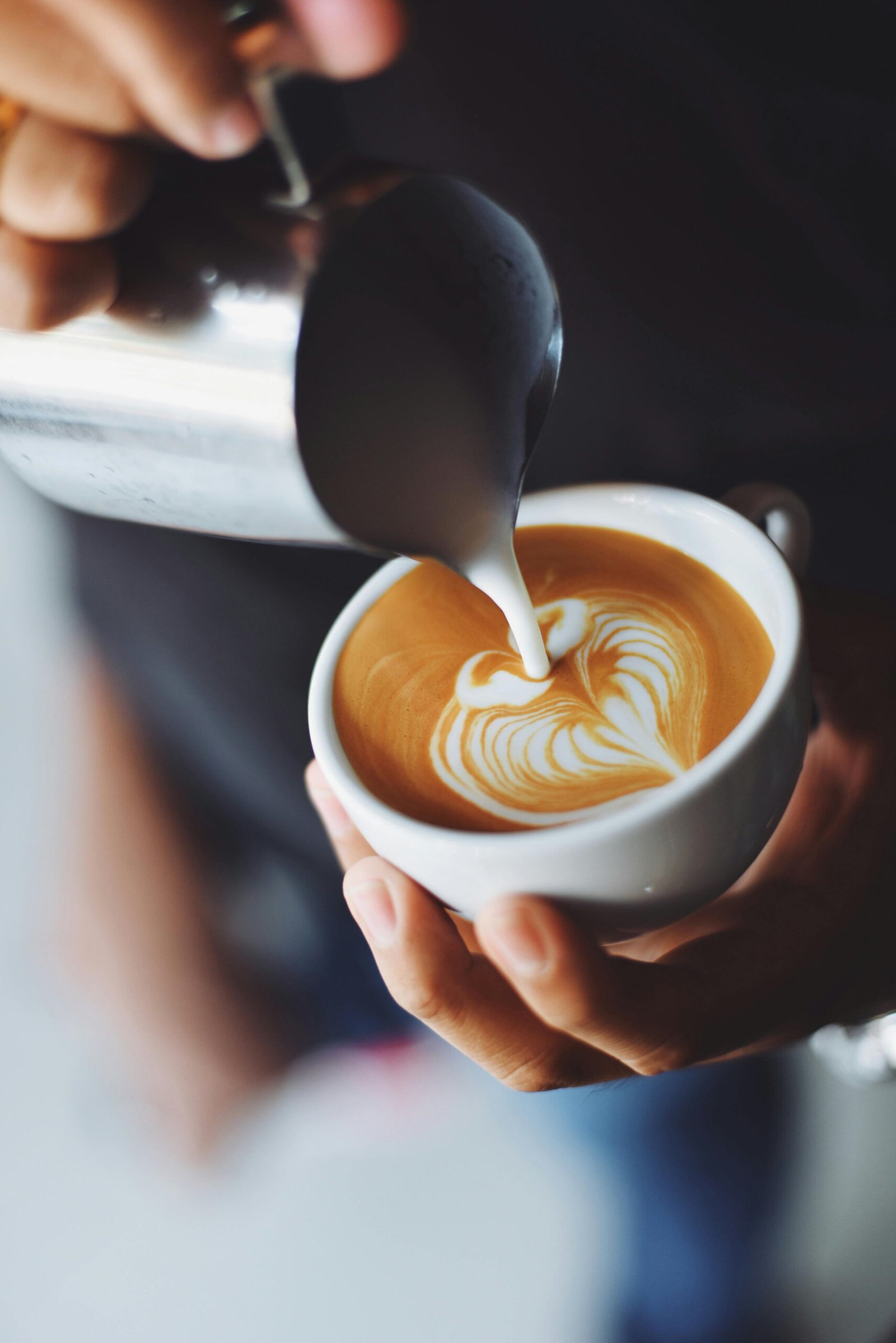 Coffee mug holding barista