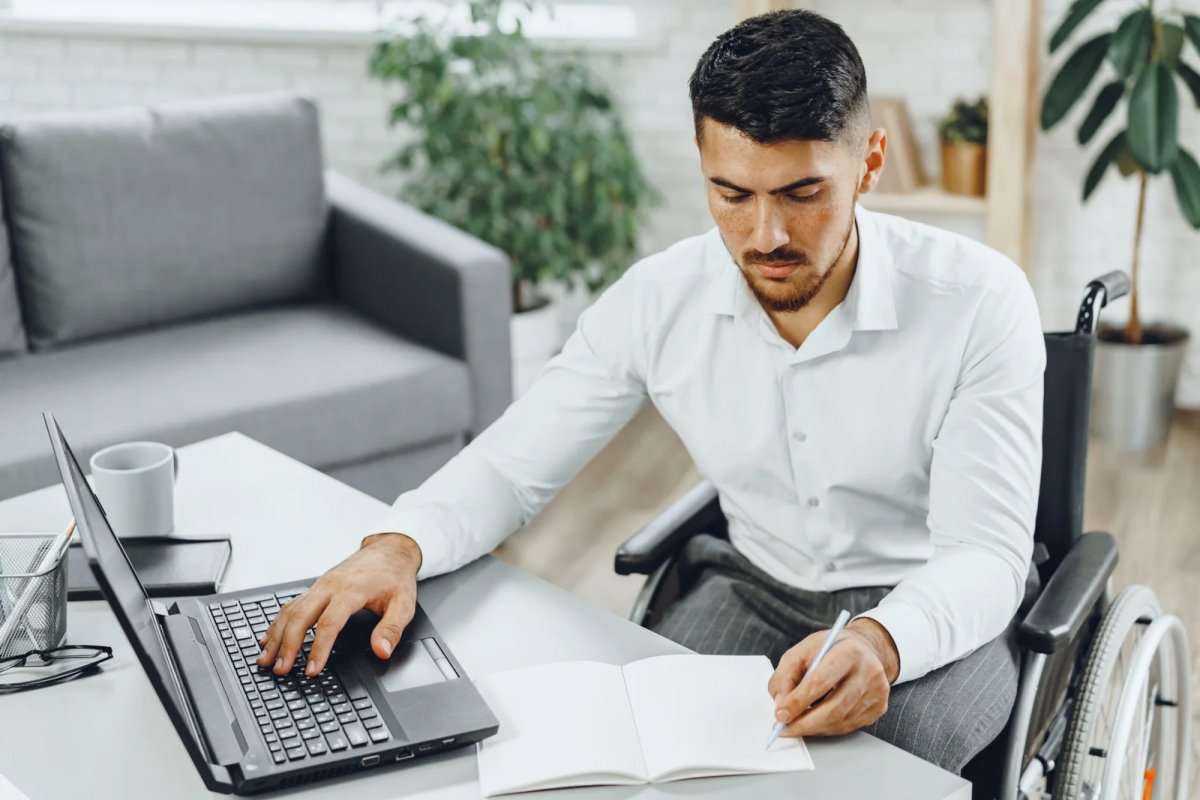 Clerk working with laptop