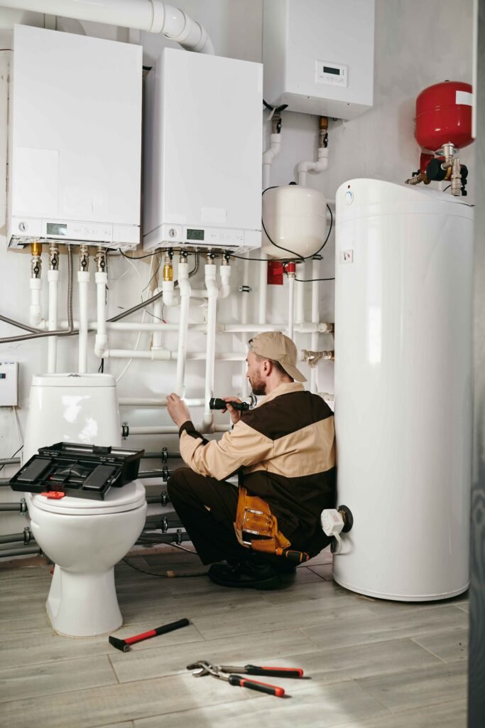 Young man working in toilet plumber work