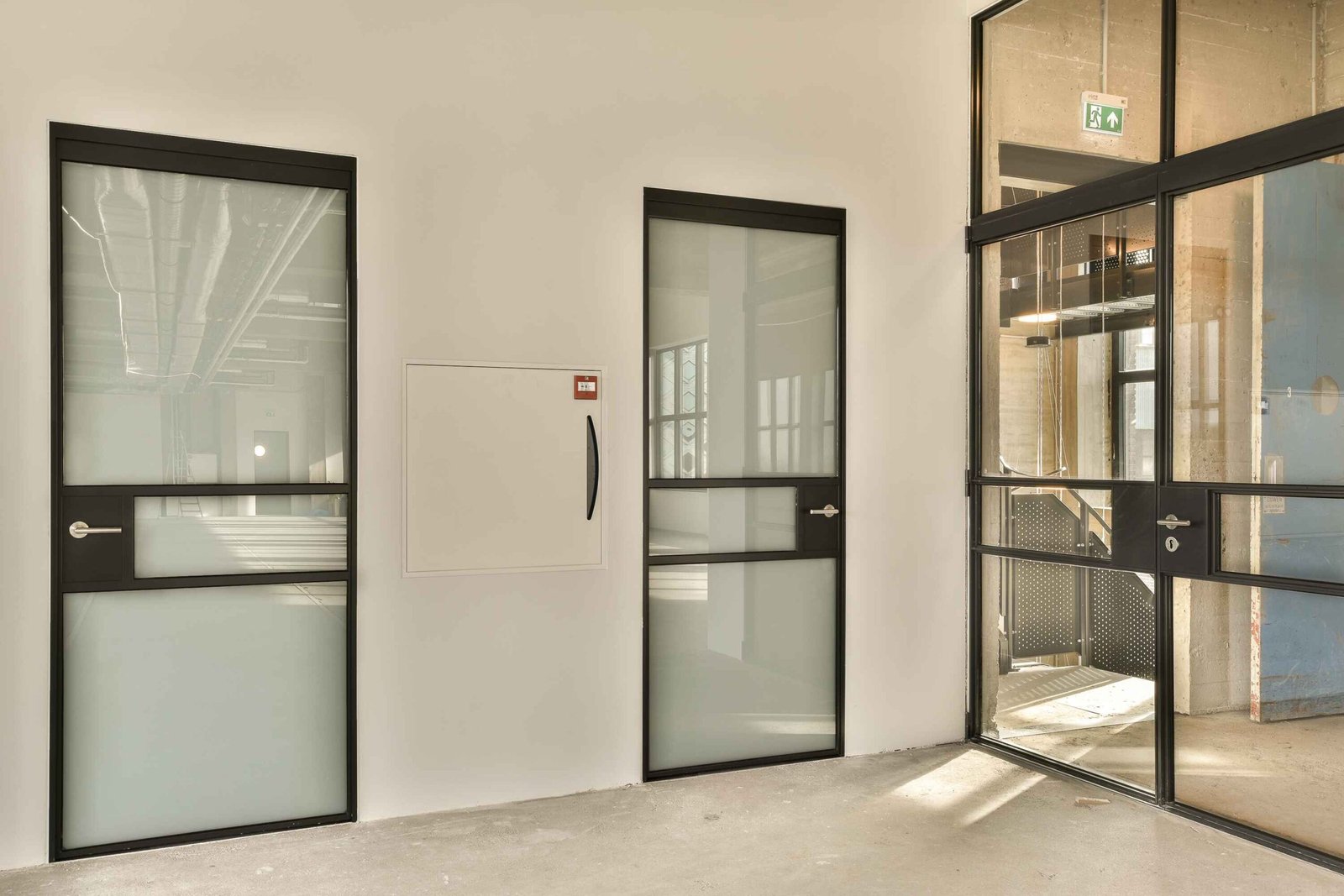 lobby-with-glass-doors-white-wall